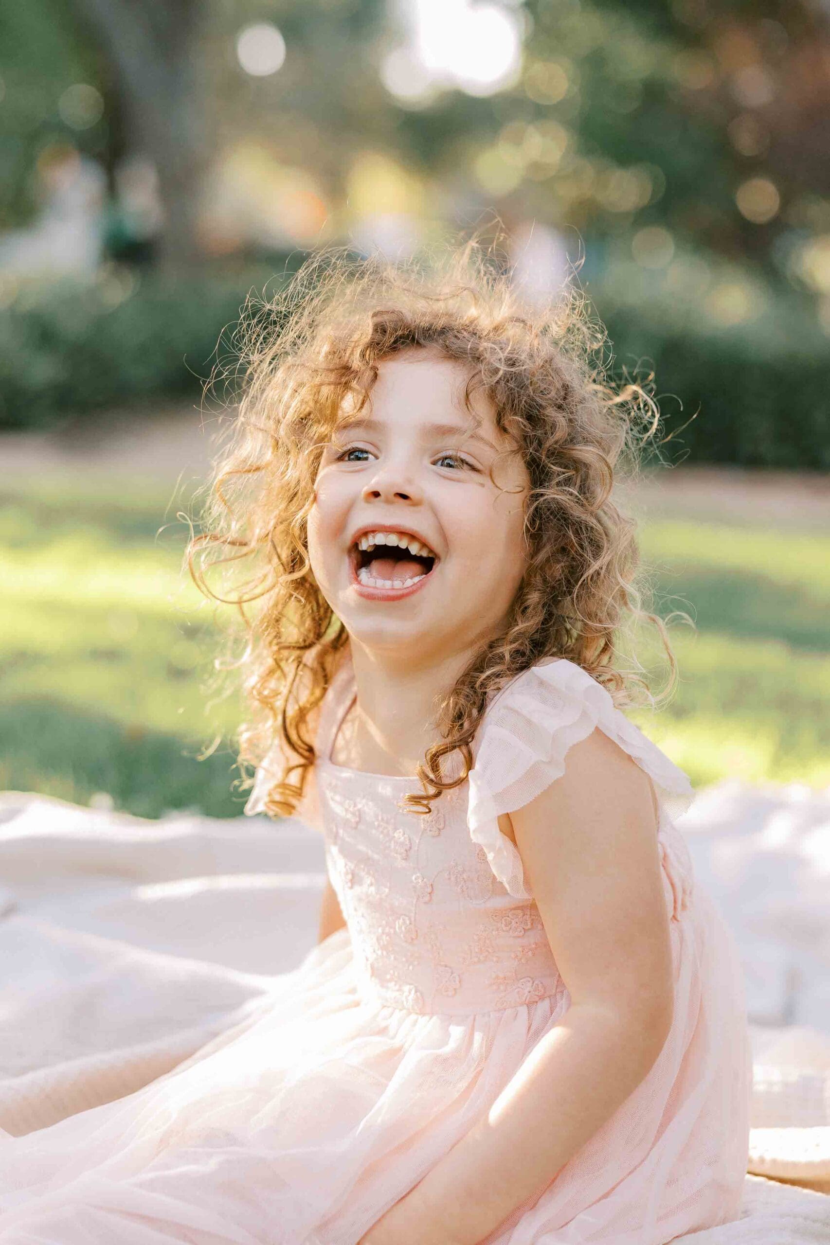 Toddler girl laughing