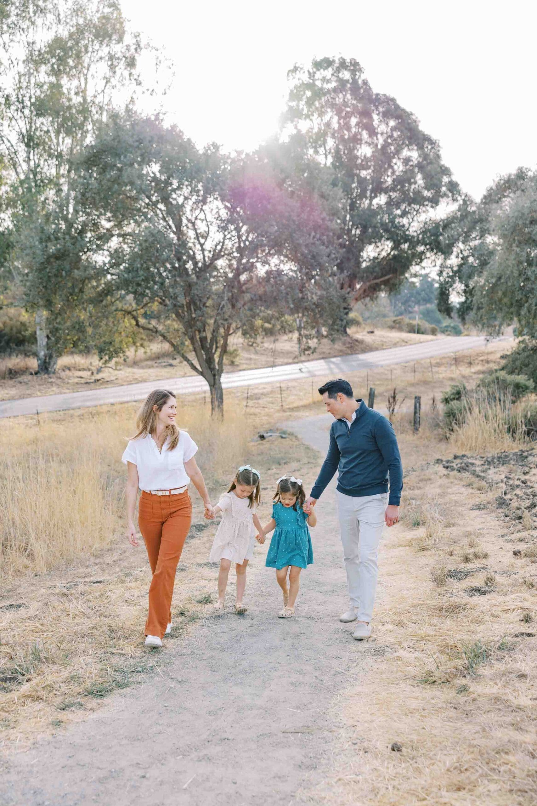 Family of four walking at Arastradero Preserve in Palo Alto