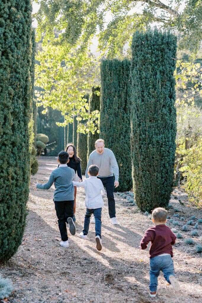 Kids running to parents at a family photoshoot at Filoli Historic House