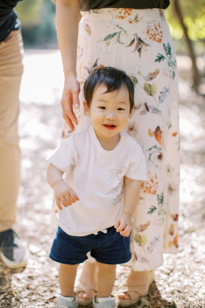 Toddler boy smiling at camera