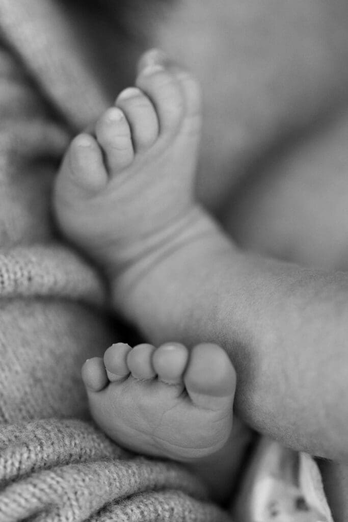 Macro black and white shot of baby's toes