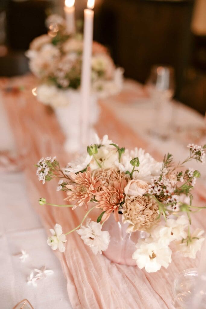 Pink table with beautiful floral arrangement