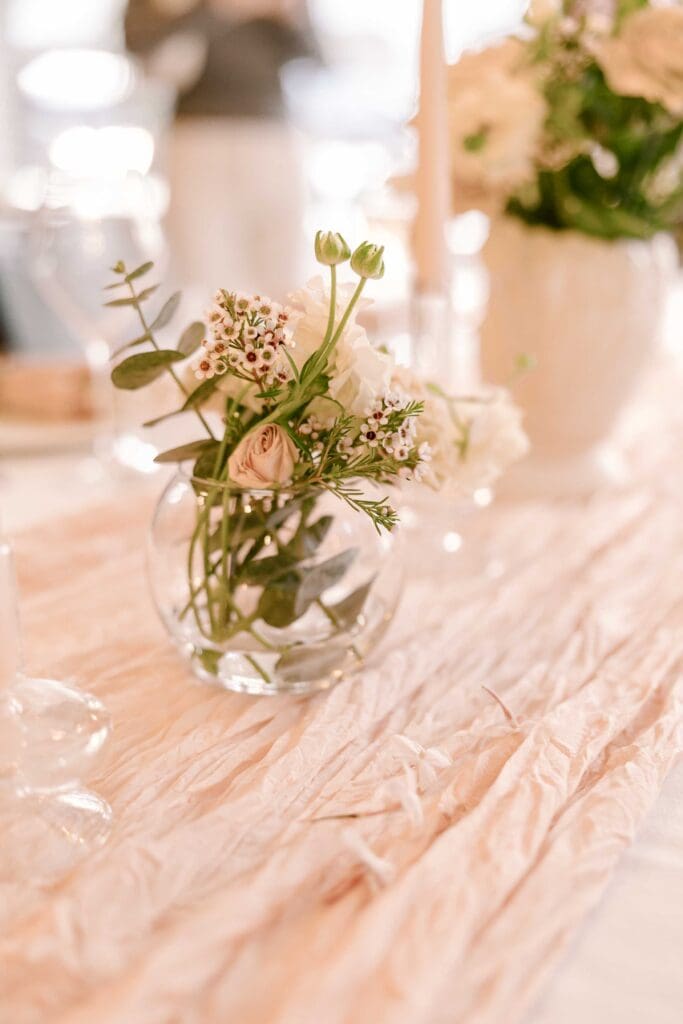 Glass bowl vase with flowers inside