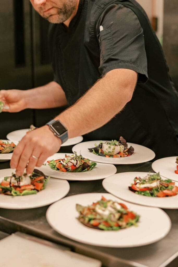 Chef Julien preparing a strawberry balsamic salad